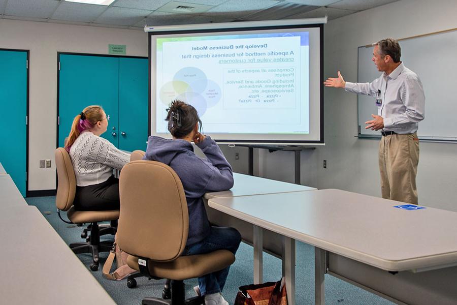 A San Juan College business professor leading a class